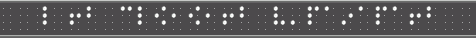 Text 'IN MOON LESEN' in Moon-9 auf einer Braillezeile